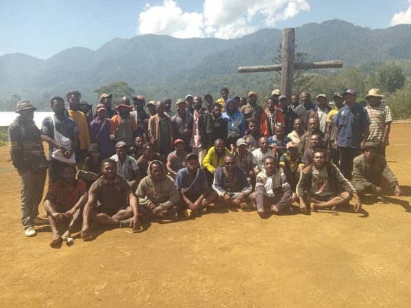 Community members organising for peacebuilding after Community Curriculum training. St Christopher Alive Association, Gena, Simbu. July 2026.