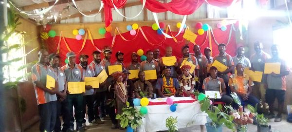 Community facilitators with their certificates at the facilitators' graduation. St Christopher Alive Association, Simbu. September 2026.
